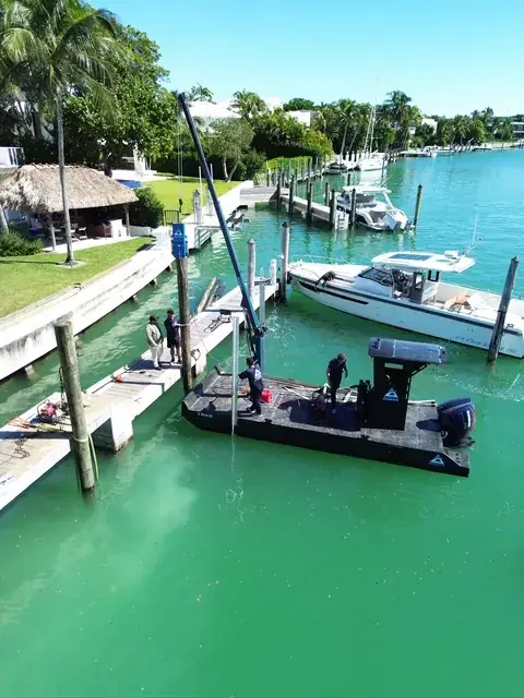 Workshop — Custom teal crane mast — staged & ready | HDPE work barge for sale, Fort Myers, FL