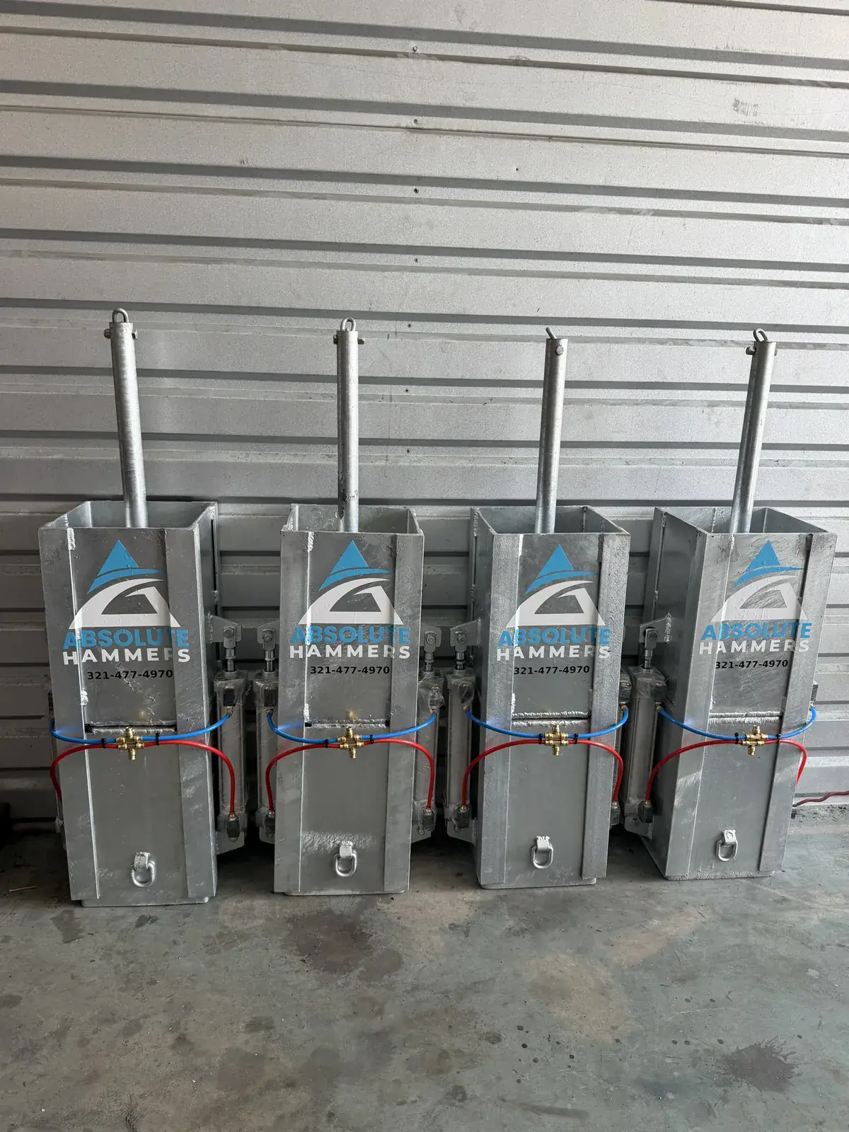Row of hammers at an angle showing the pneumatic hardware